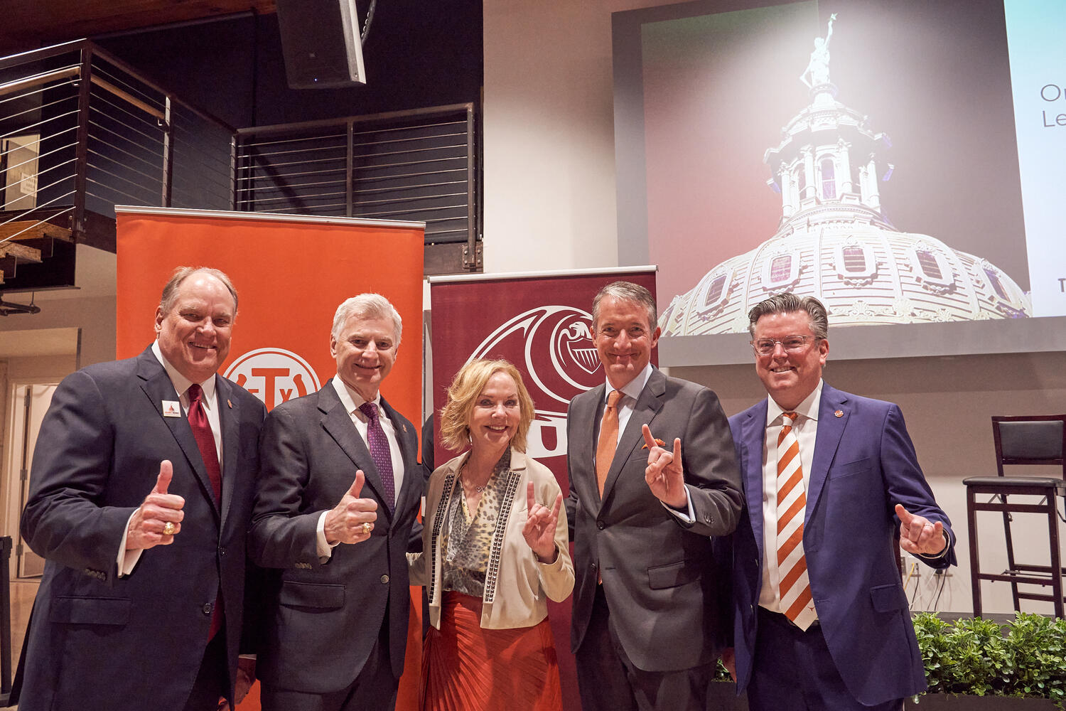 From left to right:  The Association of Former Students of Texas A&amp;M, President, Porter S. Garner III and Chairman of the Board, Robert E. &quot;Bob&quot; Jordan, stand with current Texas Exes President, Gay Gaddis, University of Texas President, Jay Hartzell, and Texas Exes Executive Director, Chuck Harris stand together in their efforts during the 2023 Orange and Maroon Legislative Day.