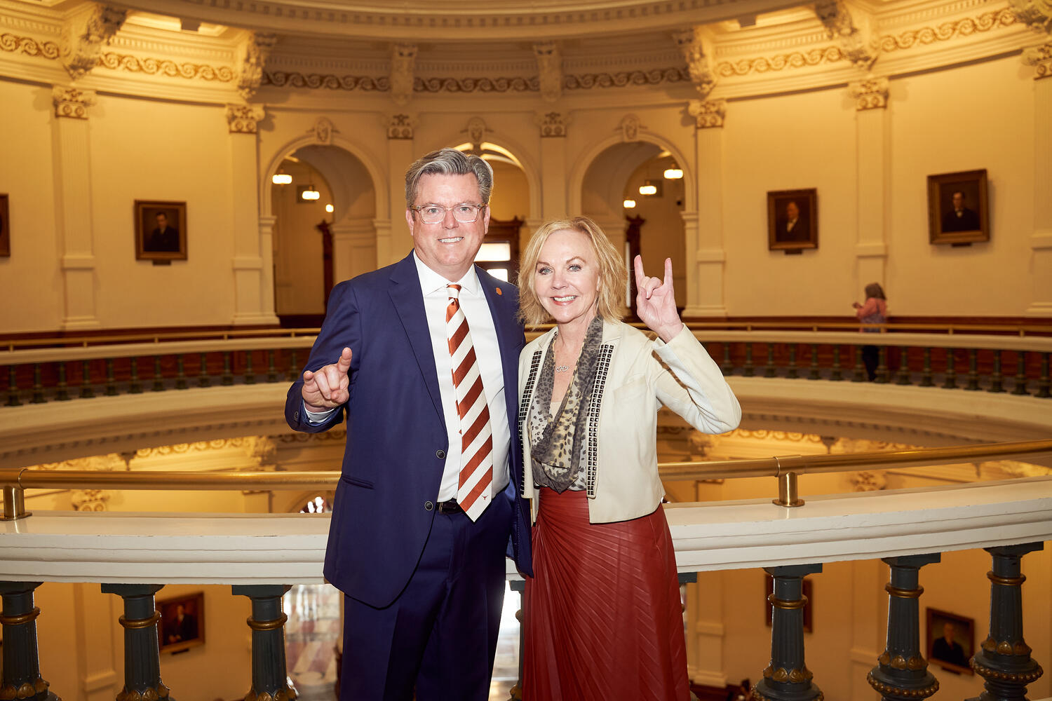 Texas Exes Executive Director, Chuck Harris and current President, Gay Gaddis at the Capitol during the biannual Orange and Maroon Legislative Day.