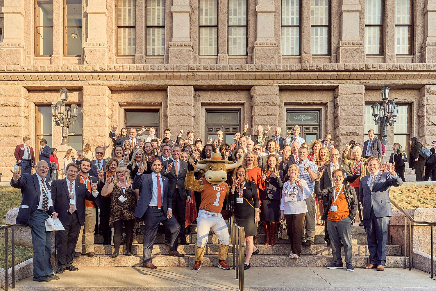 Burnt Orange advocacy. Volunteers show their spirit at the end of a long day of walking the Capitol halls.
